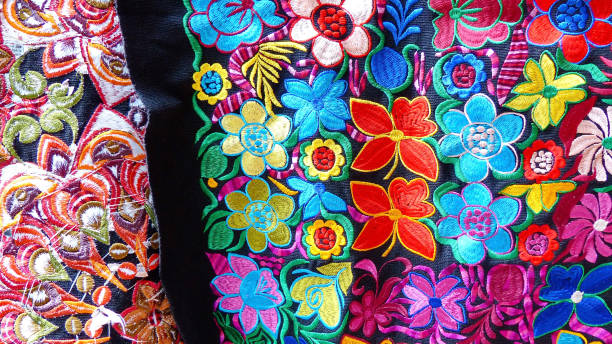 istock Colorful embroidered textiles in Otavalo, Ecuador 1160595396