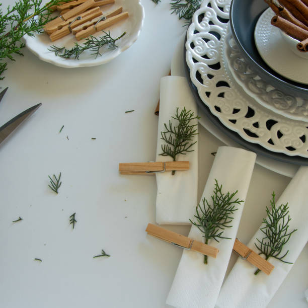 istock Preparations about arranging the table for winter holidays. Winter decoration, DIY 1160596827