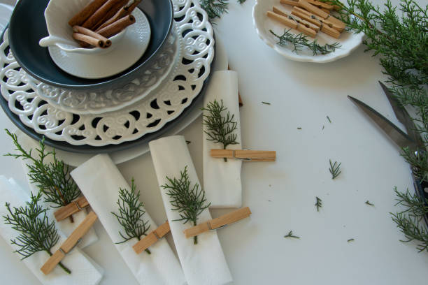 istock Preparations about arranging the table for winter holidays. Winter decoration, DIY 1160596828