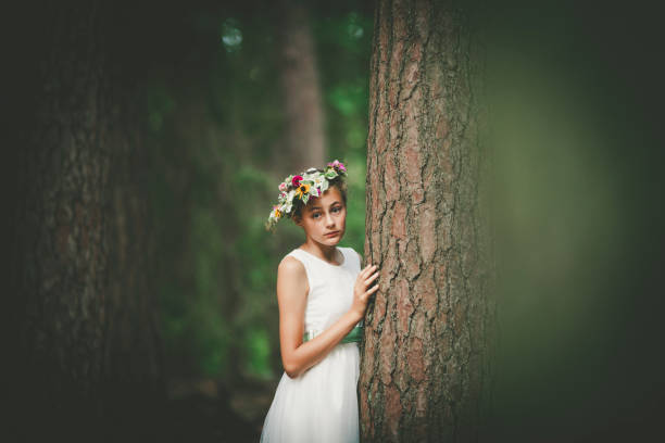 istock little girl in the forest 1160597264