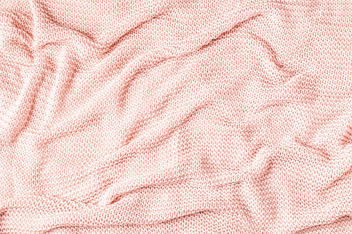 Background with pink plaid, top view, copy space.