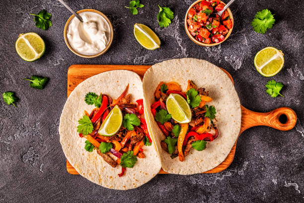 istock FAJITAS with colored pepper and onions 1160598475