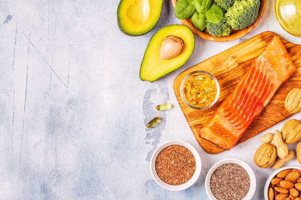 animal and vegetable sources of omega-3 acids. balanced diet concept. - nutritional supplement salmon food flax imagens e fotografias de stock