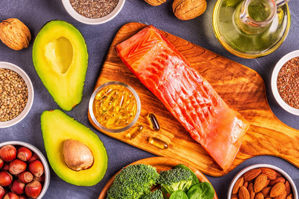animal and vegetable sources of omega-3 acids. balanced diet concept. - nutritional supplement salmon food flax imagens e fotografias de stock