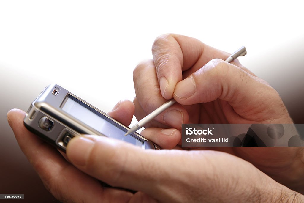 Mão com PDA - Foto de stock de Agenda Eletrônica royalty-free