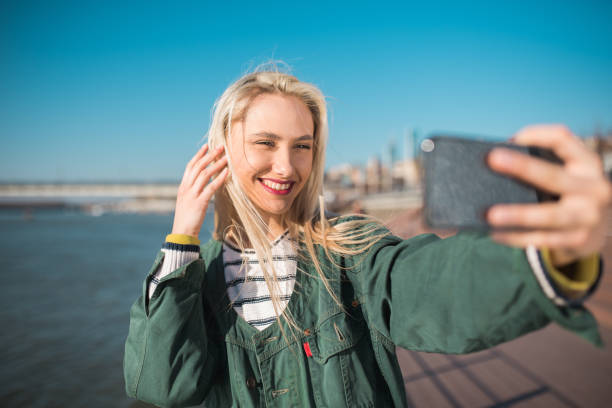 istock Girl taking a selfie 1160607170