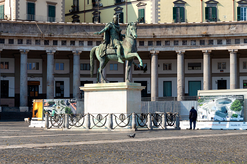Statue of king Ferdinand I opposite the Church of San Francesco di Paola in Naples, installed on the main square of the city - Piazza del Plebiscito.