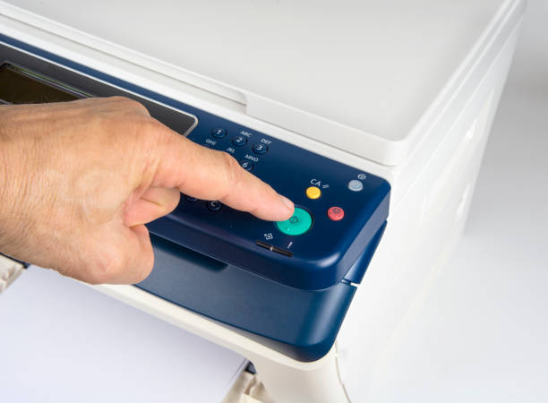 istock Finger is pushing OK button to print a page 1160612232