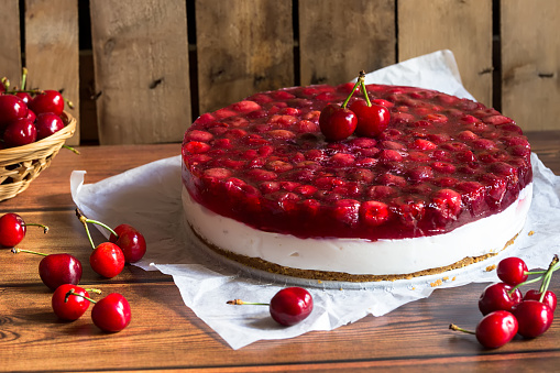 Cold cheesecake with cherry jelly, tasty and fresh, vegetarian