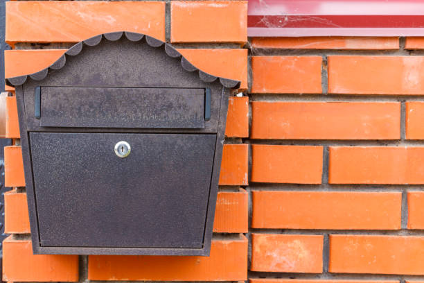 istock A beautiful mailbox hangs waiting for newspapers, parcels and letters. 1160614774