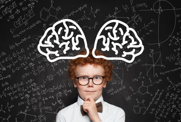 istock Thinking child genius in classroom portrait 1160616366