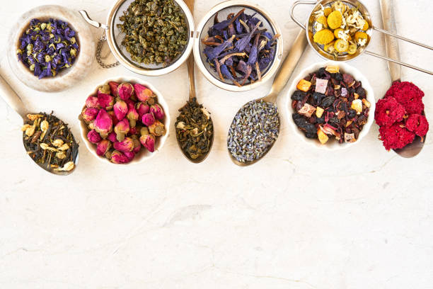 istock Different herbal and fruit dry teas on marble table. Top view flat lay with copy space 1160620162