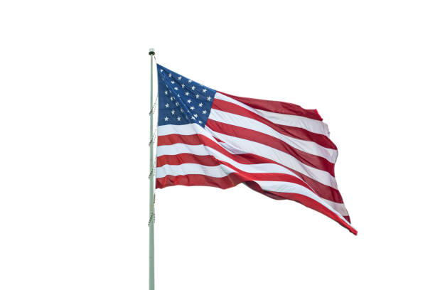 istock United States flag on a pole waving isolated on white background. 1160620587
