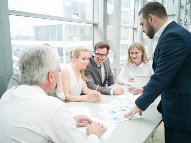 istock Business people discussing diagrams 1160623485