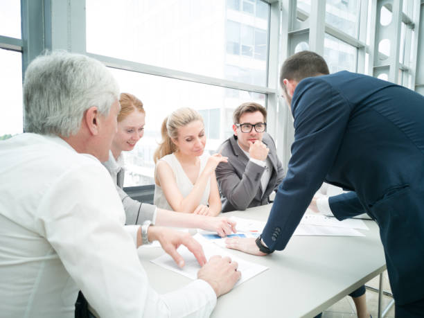 istock Business people discussing diagrams 1160623508