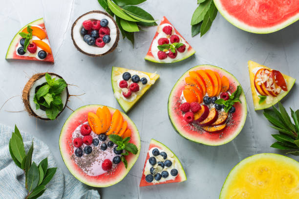 istock Healthy summer breakfast with fruit salad and yogurt in watermelon 1160623795