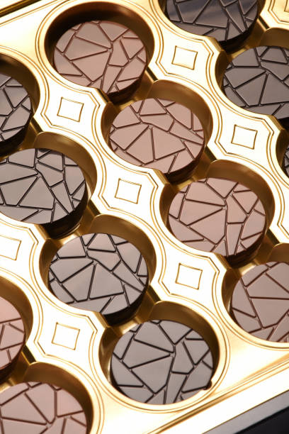 istock Chocolate box, circle shape dark and milk chocolate in a box 1160624915