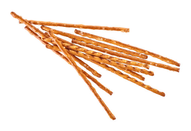 istock Bread sticks straws with salt on a white background. Salty snacks. 1160625929