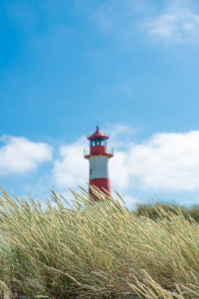 istock Lighthouse red white on dune. Sylt island – North Germany. 1160627463