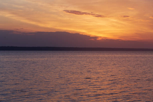 istock early morning sunrise on a choppy river 1160631114