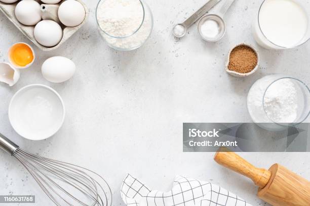 Baking And Cooking Ingredients On Bright Grey Background Stock Photo - Download Image Now