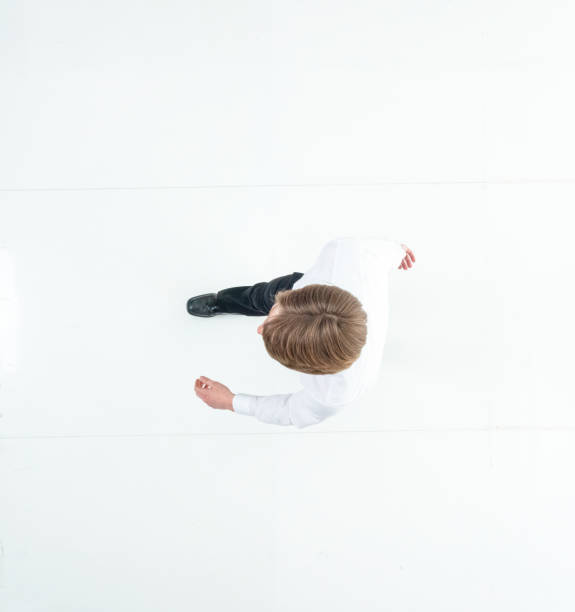 istock Directly above view of businessman walking 1160633842