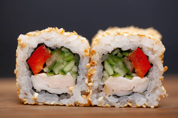 istock Sushi roll with salmon, cheese and cucumb 1160633872