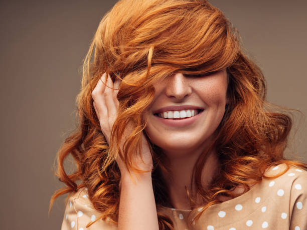 tender girl with fluffy red hair - beautiful red hair curly hair human hair imagens e fotografias de stock