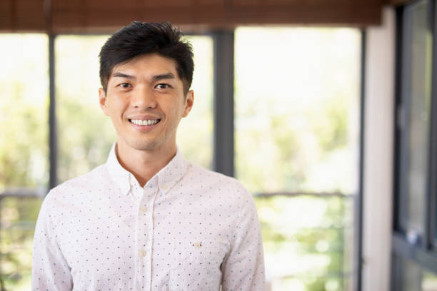 istock Young man smiling portrait 1160636250