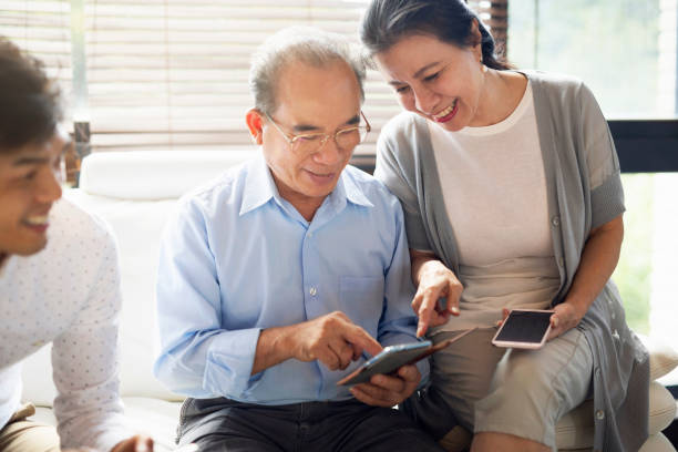 istock Senior couple using smartphones 1160636291