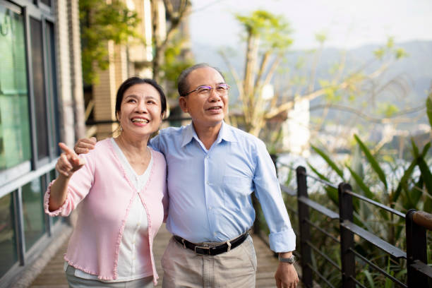 istock Elderly couple enjoying on balcony 1160636418
