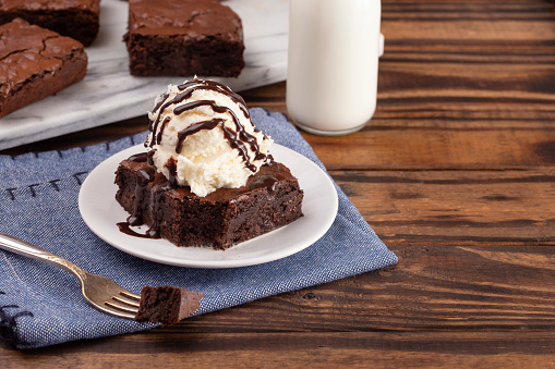 Homemade Double Chocolate Brownies Sundae with Vanilla Ice Cream on Top