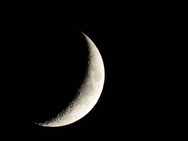 istock Beautiful crescent moon with its well-visible craters 1160641504