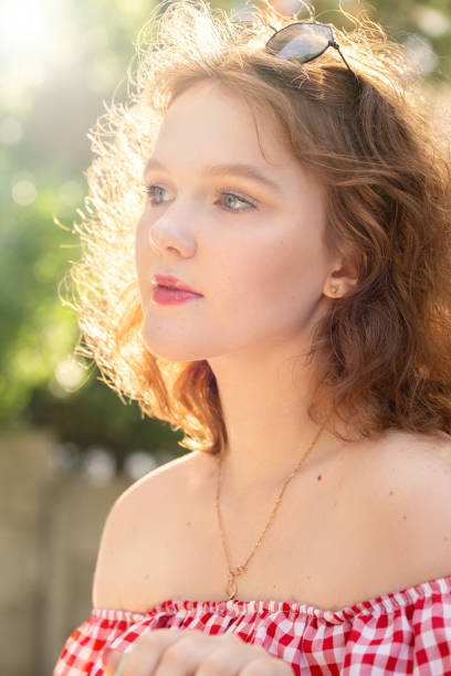 istock girl with bare shoulders 1160642458
