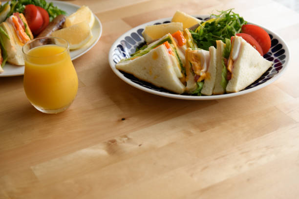 istock Club sandwich on a wooden table. 1160642849