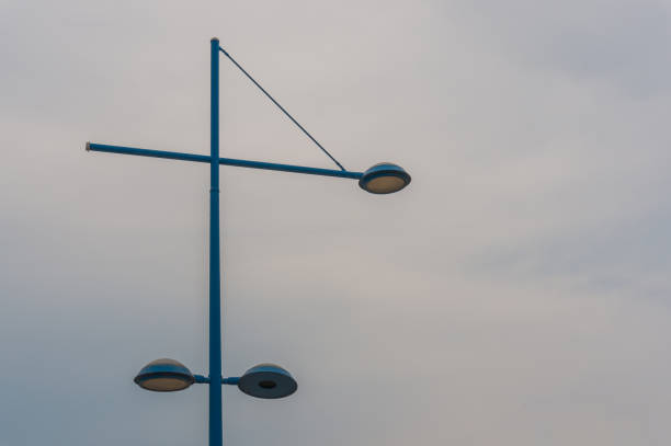 istock Street lights against a cloudy sky 1160643662