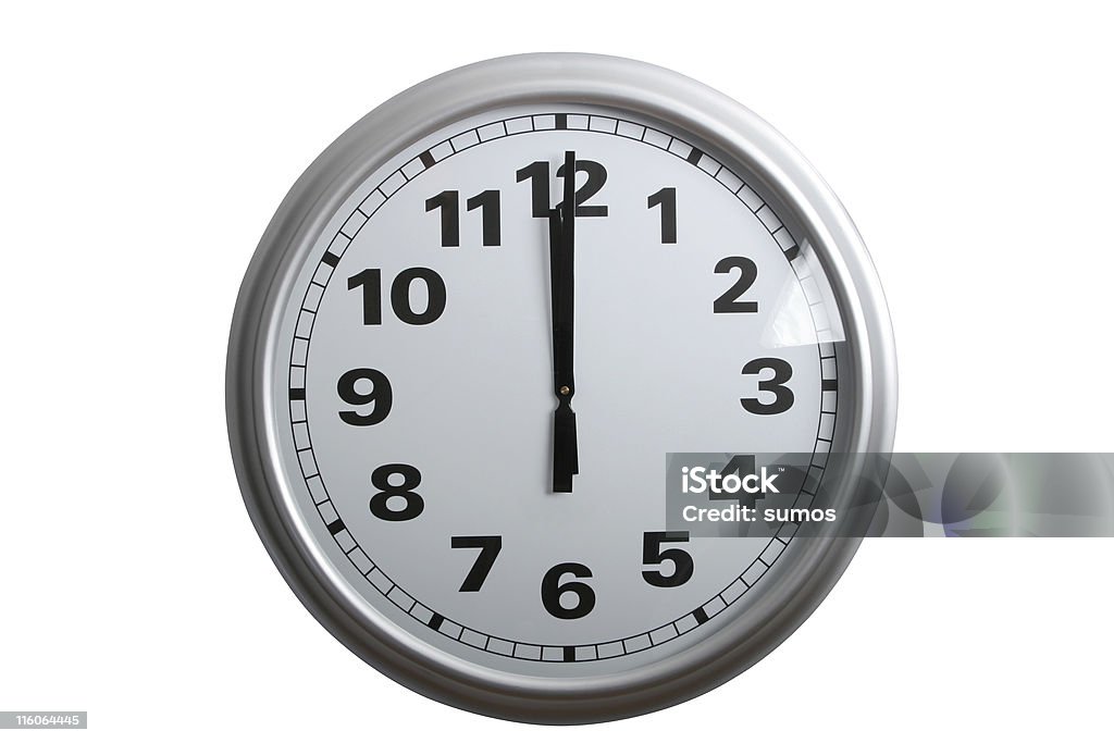 twelve o'clock A stylish wall clock showing 12 o'clock, isolated on white with clipping path 12 O'Clock Stock Photo