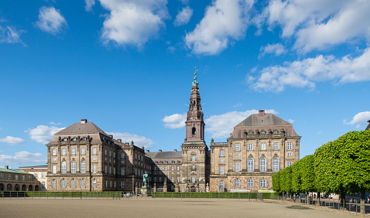Copenhagen, Denmark - May 29, 2019: The Christiansborg Palace is the seat of the Danish Parliament, the Danish Prime Minister's Office and the Supreme Court of Denmark.