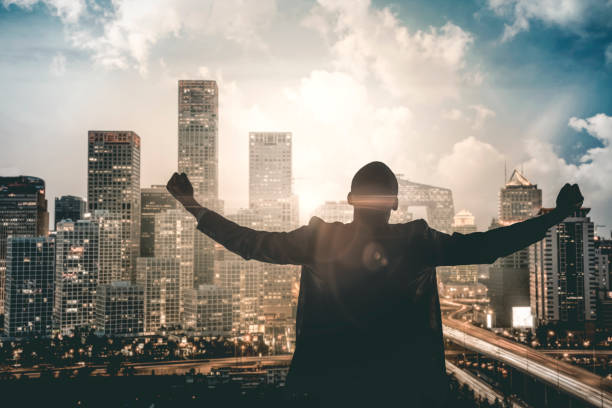 istock Businessman cheering achievement in downtown Beijing 1160645307
