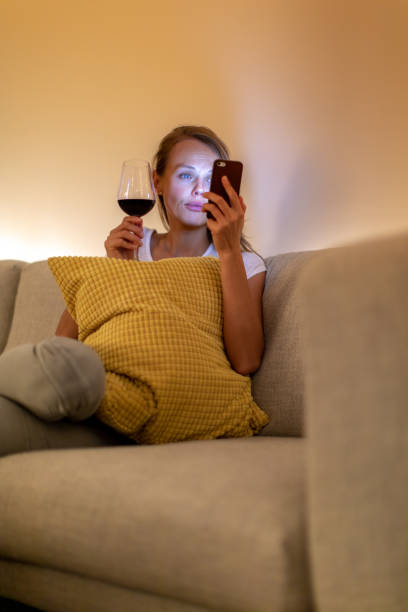 istock Cute young woman using her cell phone 1160652703