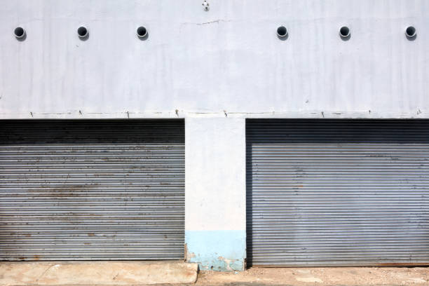 istock close up warehouse rolling metal doors 1160654026