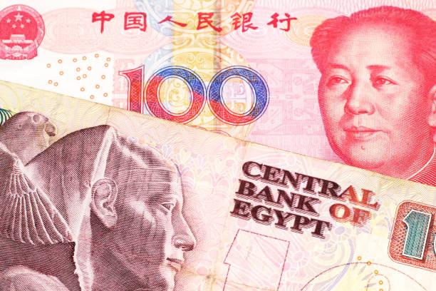 istock A Chinese yuan bank note with an Egyptian pound note 1160654760