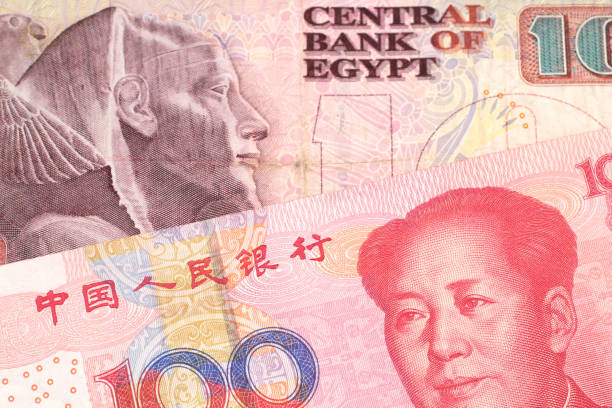 istock A Chinese yuan bank note with an Egyptian pound note 1160654961