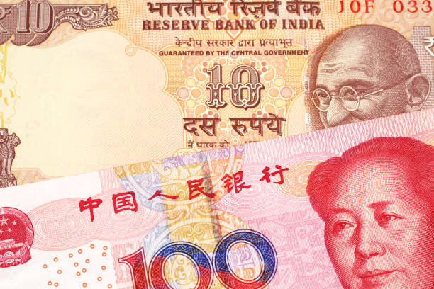 istock A Chinese yuan bank note with an Egyptian pound note 1160655089
