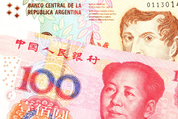 istock A peso note from Argentina, close up with a Chinese, yuan bill 1160656022