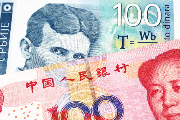 istock A Serbian dinar note with a Chinese yuan bill 1160656635