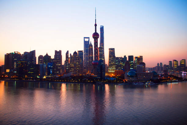 istock Shanghai's Pudong District cityscape illuminated at dawn 1160658090