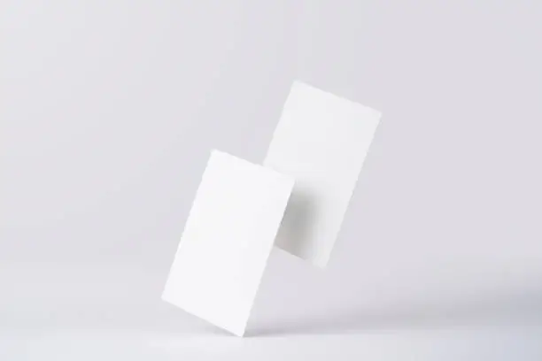 Photo of front view of white business card on white