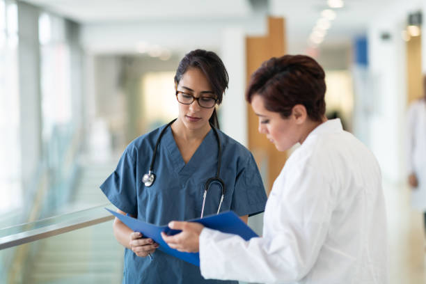 istock Medical team discusses patient's course of treatment 1160659295