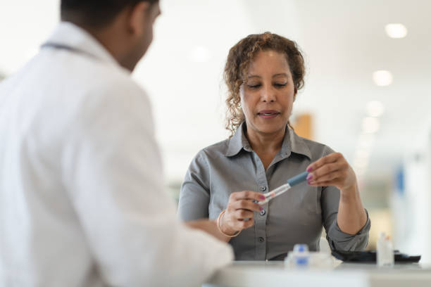 istock Diabetic patient meets with her doctor 1160659328